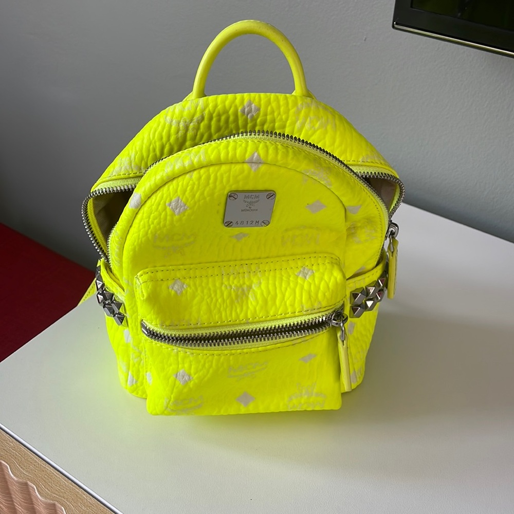 Neon yellow MCM mini backpack